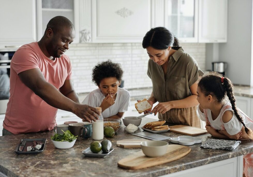 Family making breakfast together